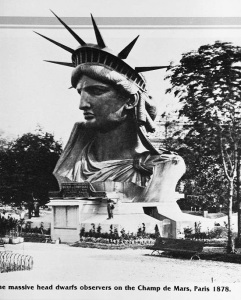 View of the head of the Statue of Liberty, designed by sculptor Frederic Auguste Bartholdi, on display on the Champ de Mars, Paris, France, 1878. (Photo by Hulton Archive/Getty Images)